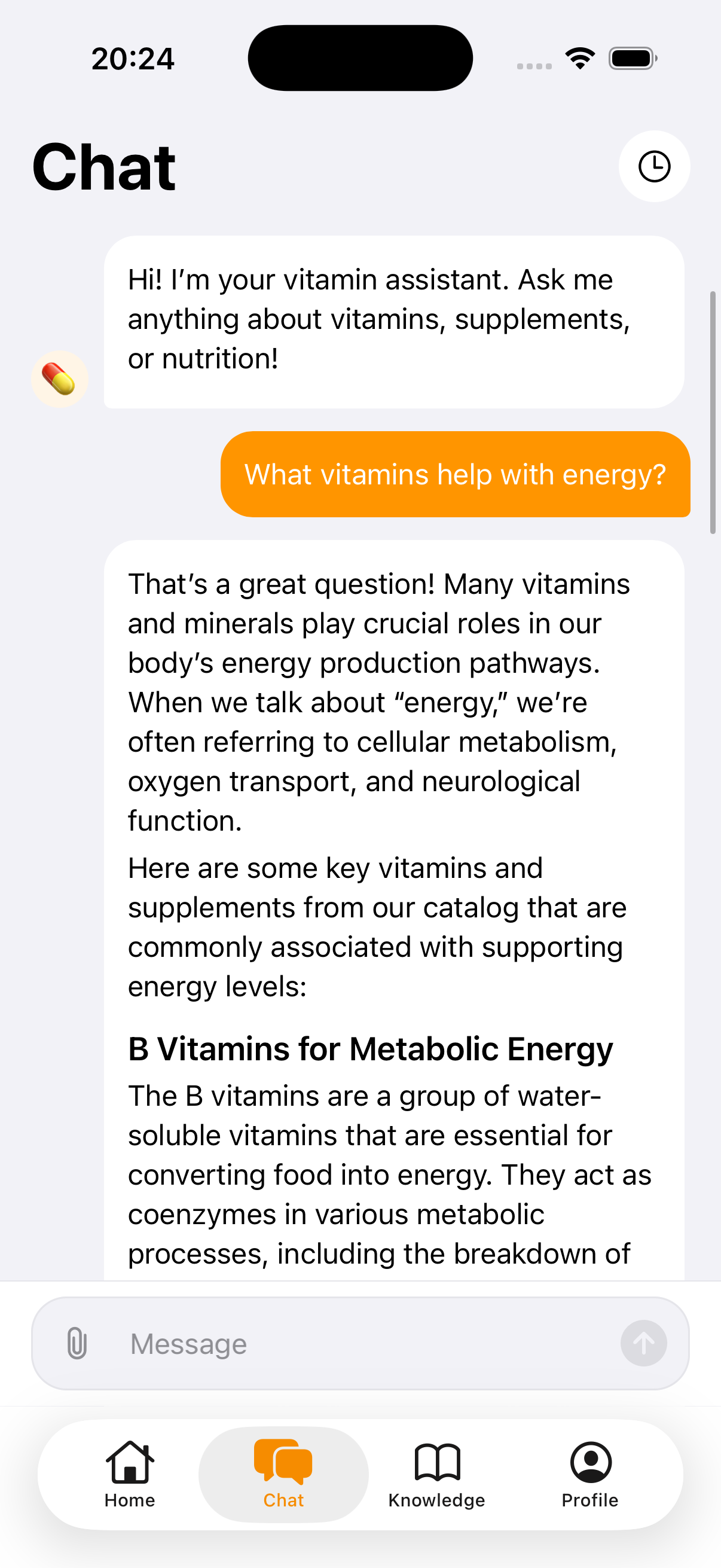 VitaminHelper AI chat answering a question about vitamins for energy